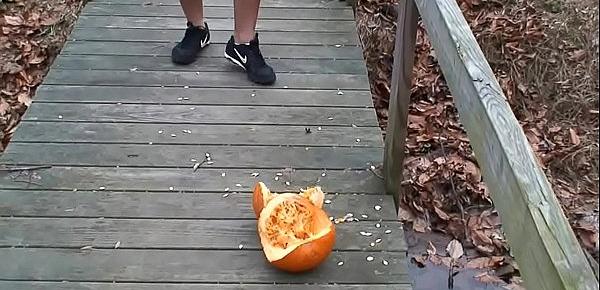 Crushes pumpkins with thighs
