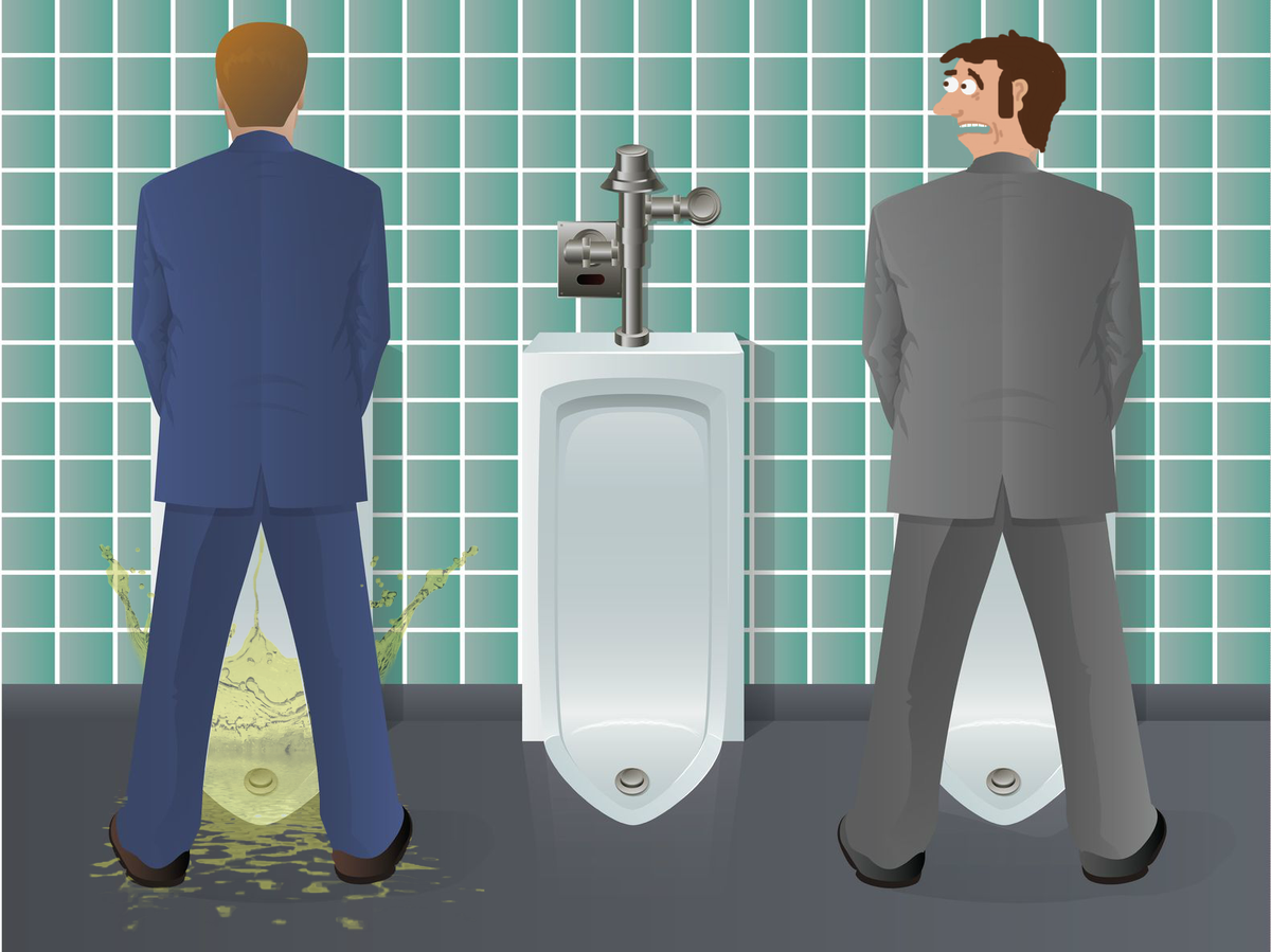 Guys peeing in urinals