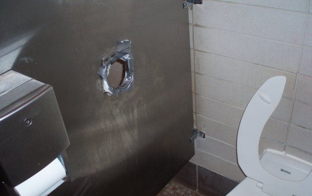 College toilet stall gloryhole