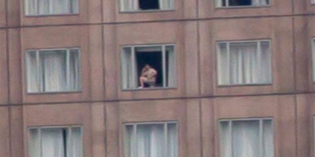 Punkin reccomend Naked man hotel window