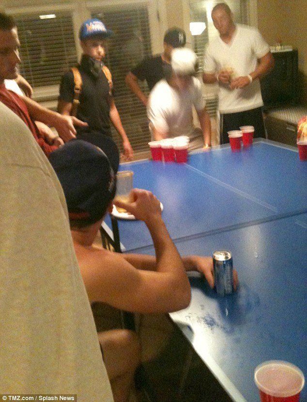 Young boys beer pong