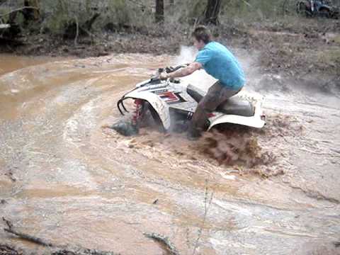 Four wheelers mud bogging