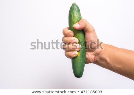 Holding penis in hand