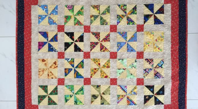 Gully reccomend Pinwheel block from multiple strips