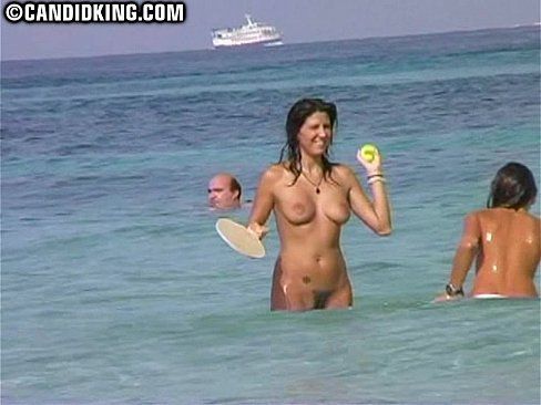 Naked female on nude beach